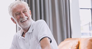 Man laughing with dentures