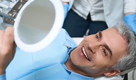 Man smiling in the dental chair